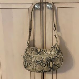 Pouch Animal Print Shoulder Bag. Goldtone Taupe & Black. 10”L x 6”H x 3.5” W.